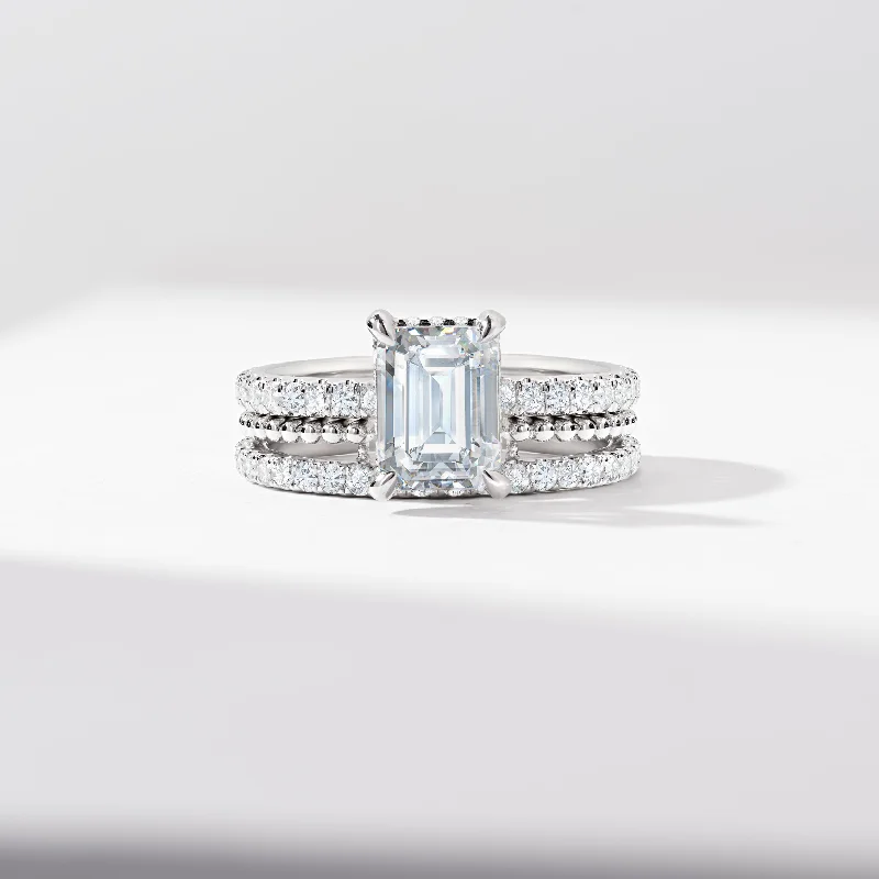 Emerald and diamond engagement ring in a vintage - inspired platinum band2.0ct Emerald Cut Diamond Solitaire With Hidden Halo And Shoulders Bridal Set 2.9tdw