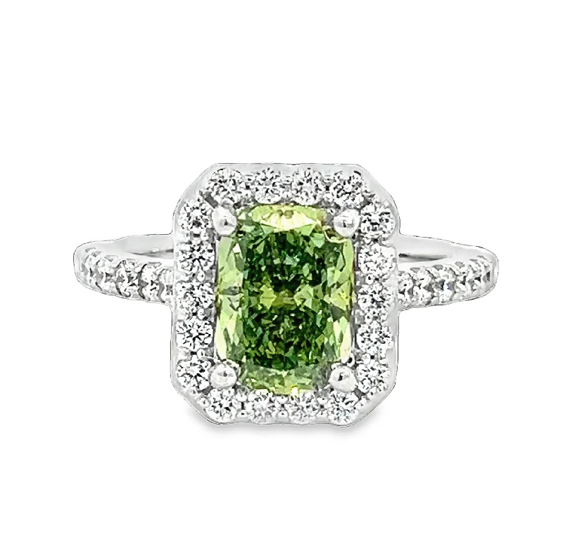 Solitaire diamond engagement ring with a platinum setting for a classic and elegant lookLAB GROWN FANCY VIVD GREEN CUSHION AND ROUND DIAMONDS 2.79ctw HALO RING