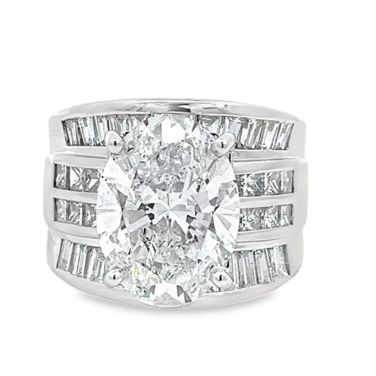 Solitaire diamond engagement ring with a platinum setting for a classic and elegant lookLAB GROWN OVAL & NATURAL PRINCESS & BAGUETTE DIAMONDS 8.49ctw CHANNEL RING