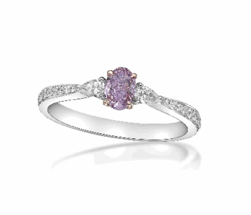 Channel - Set Women's Diamond Rings with Diamonds Securely Held in a Metal Groove for DurabilityPLEIONE  Oval Cut Fancy Purple Pink Diamond Engagement Ring GIA Certified by Mike Nekta NYC