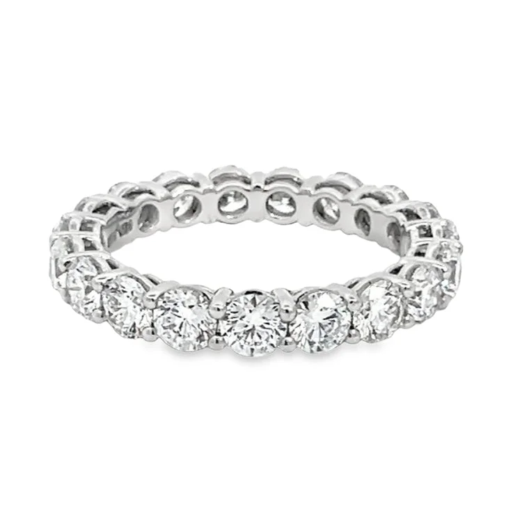 Radiant - cut diamond engagement ring with a bezel - set center stone in 18K yellow goldLAB GROWN ROUND DIAMONDS 3.63ctw ETERNITY BAND