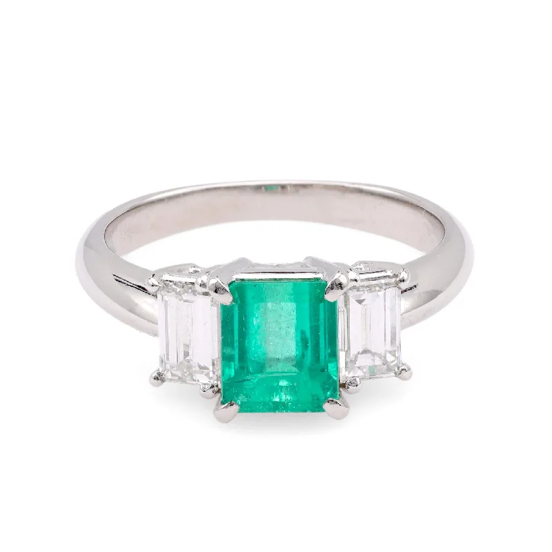 Marquise - cut diamond engagement ring with a split - shank band in platinumVintage 1.30 Carat Emerald Diamond Platinum Three Stone Ring