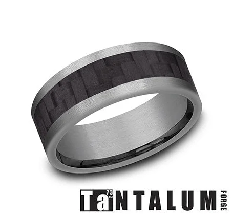 Round - cut diamond engagement ring with a twisted band design in 14K white goldTANTALUM AND CARBON FIBER 8MM BAND