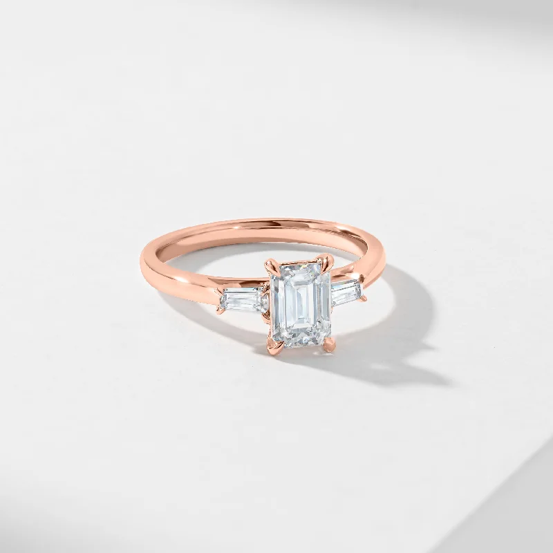 Pink diamond engagement ring in a rose - gold band with white - gold accents1.5ct Emerald Cut moissanite With Tapered Baguette Shoulders Trilogy Ring 1.62tdw