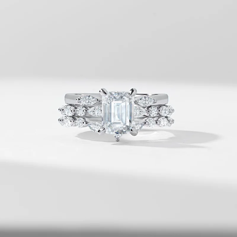 Radiant - cut diamond engagement ring with a bezel - set center stone in 18K yellow gold1.5ct Radiant Diamond Solitaire With Marquise And Round Brilliant Shoulder Contour And Open Gap Bridal Set 2.0tdw