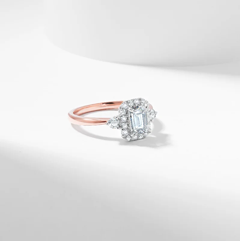 Cushion - cut diamond engagement ring with a halo of moissanite in a silver - plated bandEmerald Cut Lab Grown Diamond Halo Engagement Ring 1.19tdw