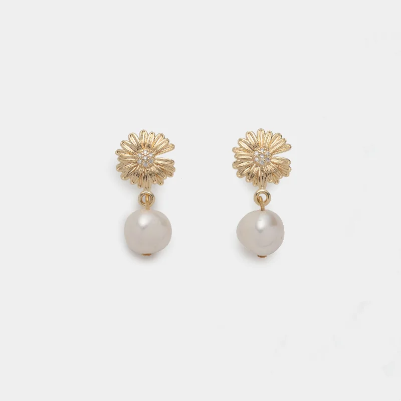 Pearl - studded drop earrings with a classic designLys Pearl Earrings