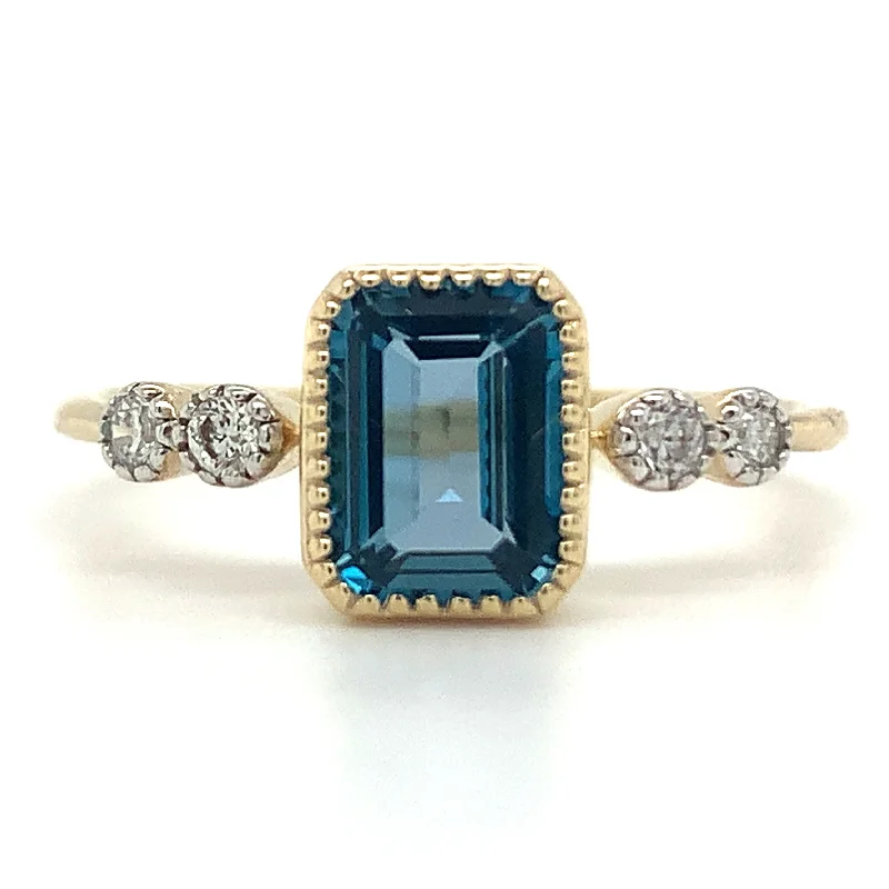 Aquamarine Gemstone Rings in 9K Gold with a Bezel Setting for a Modern and Secure Fit9ct Yellow Gold 1.32ct Emerald Cut London Blue Topaz Ring with Side Diamonds