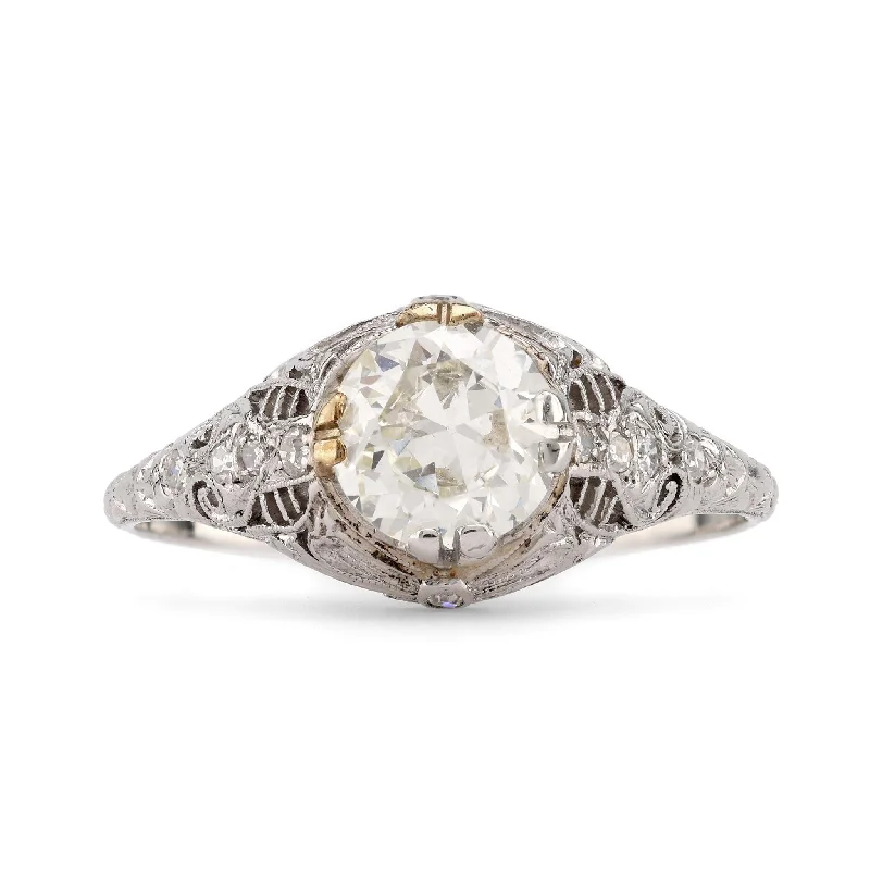 Cathedral - Style Engagement Rings with a Raised Center Stone and Intricate MetalworkArt Deco Diamond Platinum Engagement Filigree Ring