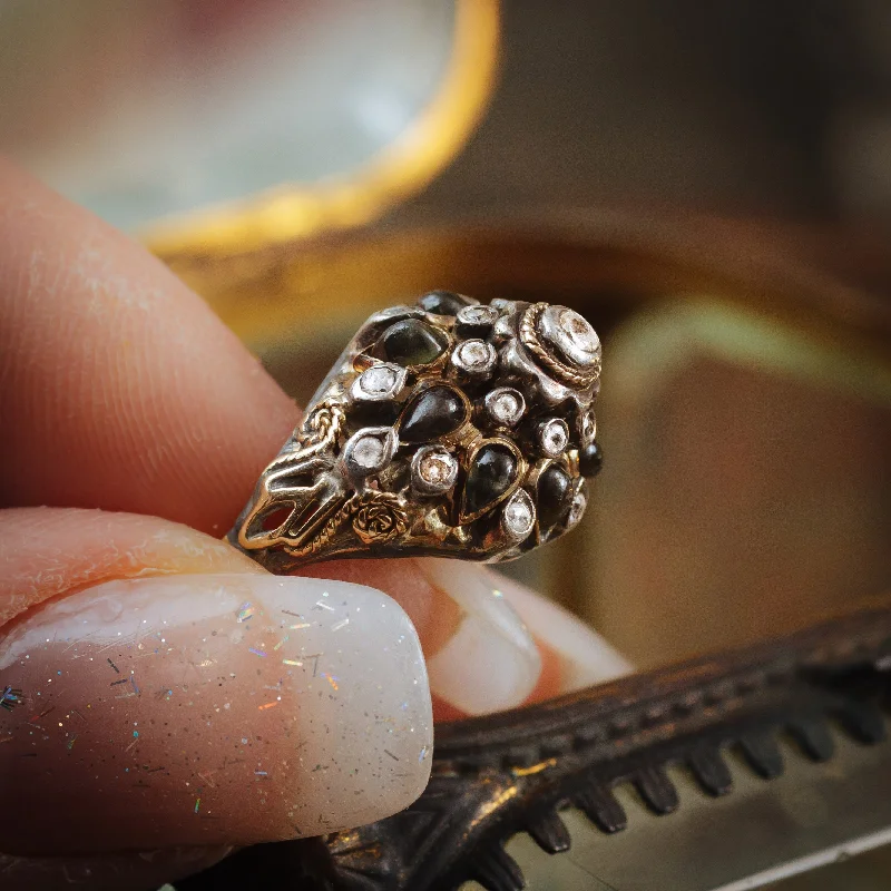 Malachite Gemstone Rings in 14K Gold with a Carved Stone for a Unique and Artistic AppealCaptivating Vintage Black Star Sapphire Thai Princess Harem Ring