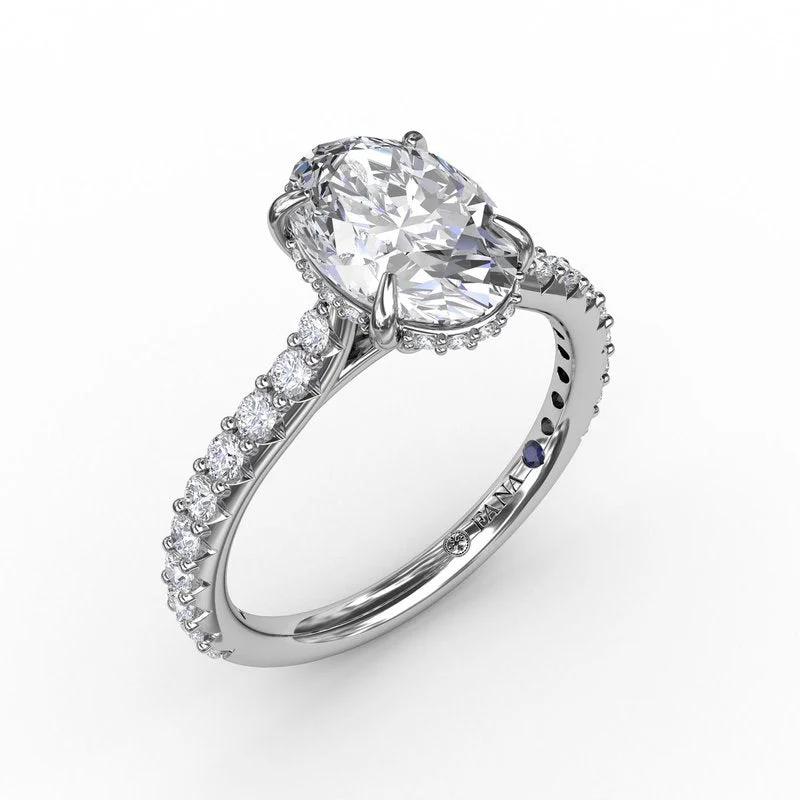 Solitaire Engagement Rings with a High - Clarity Round Diamond and Tapered BandClassic Oval Diamond Solitaire Engagement Ring With Hidden Pavé Halo