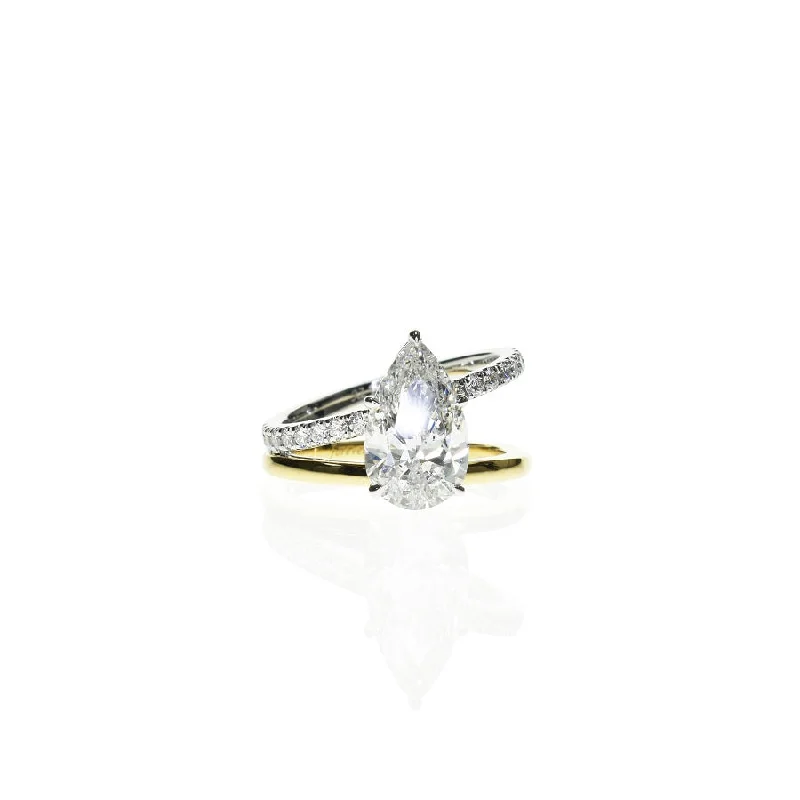 Solitaire Engagement Rings with a High - Clarity Round Diamond and Tapered BandPear Shaped Ring with a Split Band