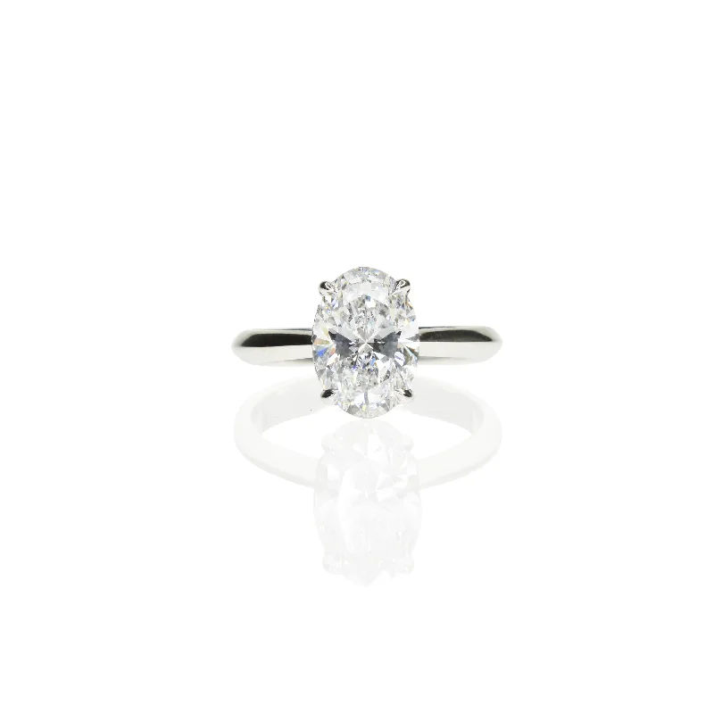 Cushion - Cut Halo Engagement Rings with a Platinum Band and Micro - Pave DetailsOval Diamond Ring with a Hidden Halo