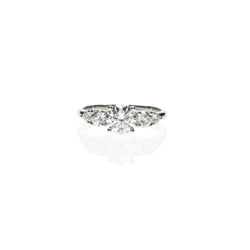 Cluster Engagement Rings with Multiple Small Diamonds Arranged in a Stunning Design5 Diamond Engagement Ring