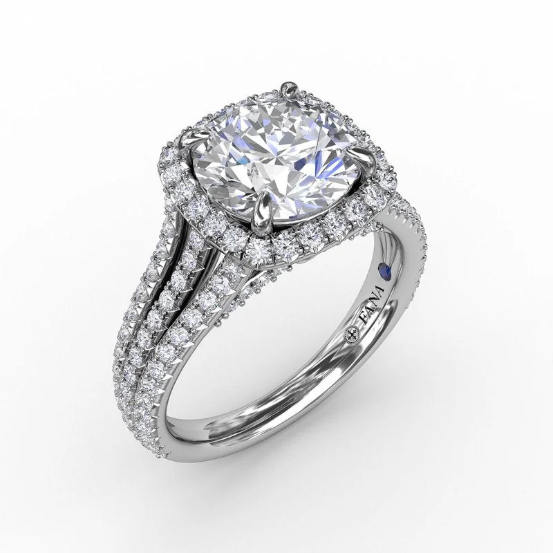 Cathedral - Style Engagement Rings with a Raised Center Stone and Intricate MetalworkRound Diamond Engagement Ring With Cushion-Shaped Halo and Triple-Row Diamond Band