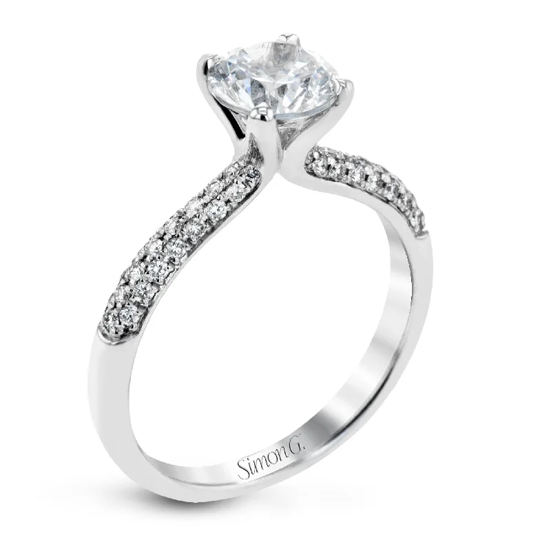 Cluster Engagement Rings with Multiple Small Diamonds Arranged in a Stunning DesignRound-Cut Engagement Ring In Platinum With Diamonds