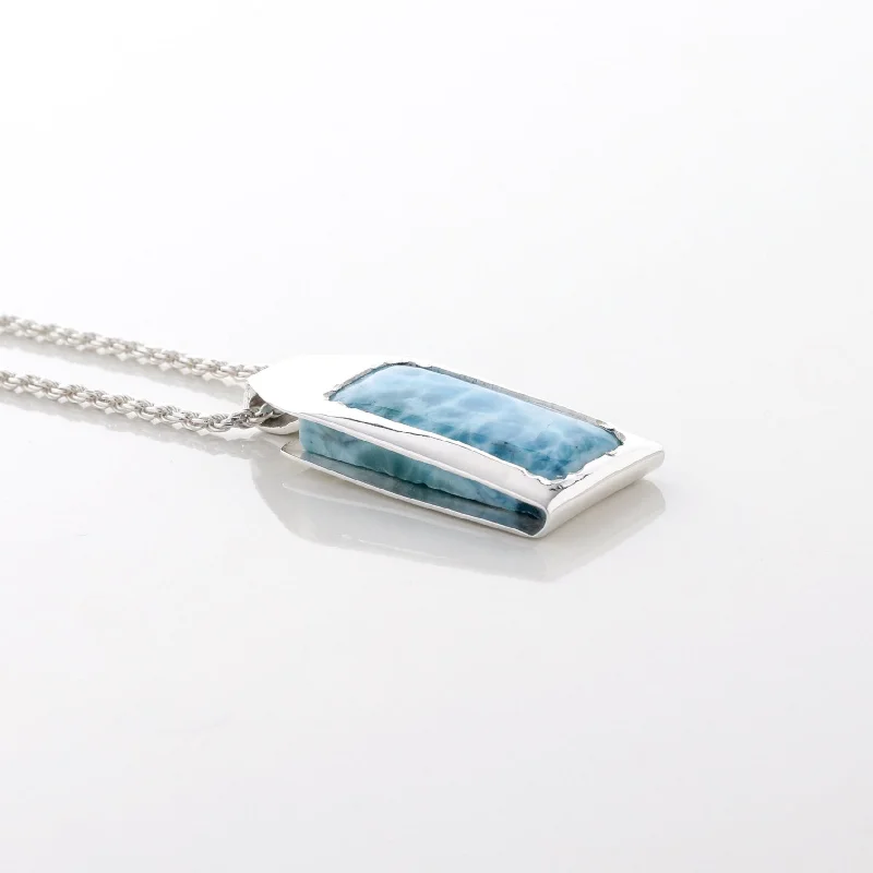 Handmade Leather - Wrapped Crystal Pendant for a Bohemian AestheticLarimar Pendant Pave